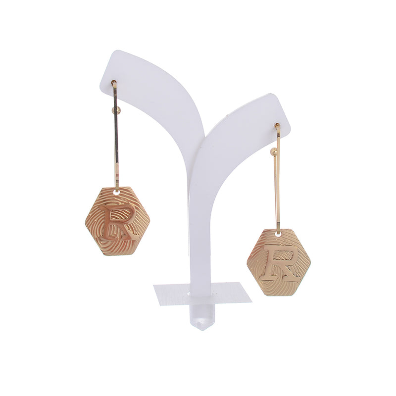 Stainless earrings with the letter “R” on a long gold hexagon shape earring with a screw