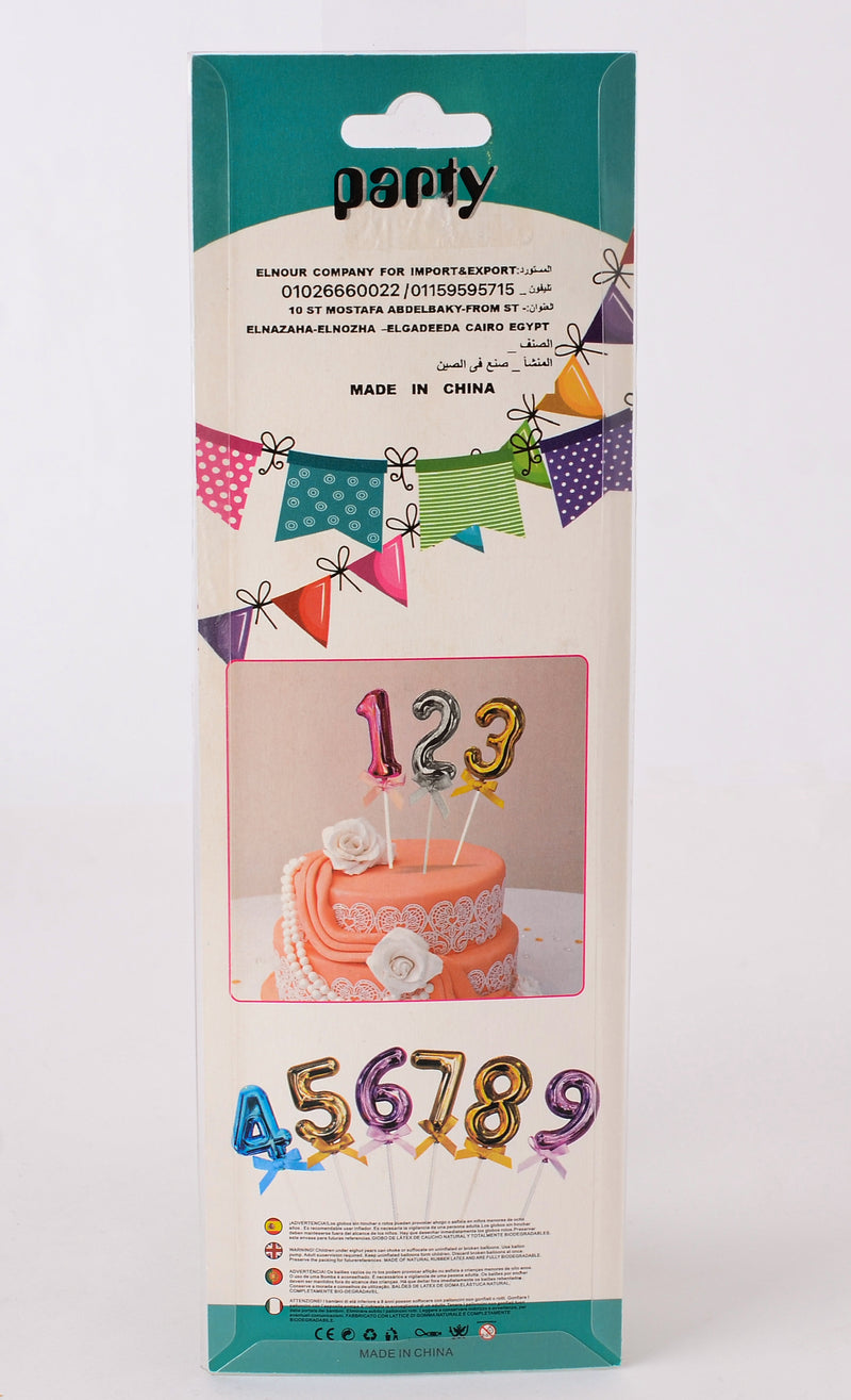 A stick decorating the cake and celebration number 1, silver color