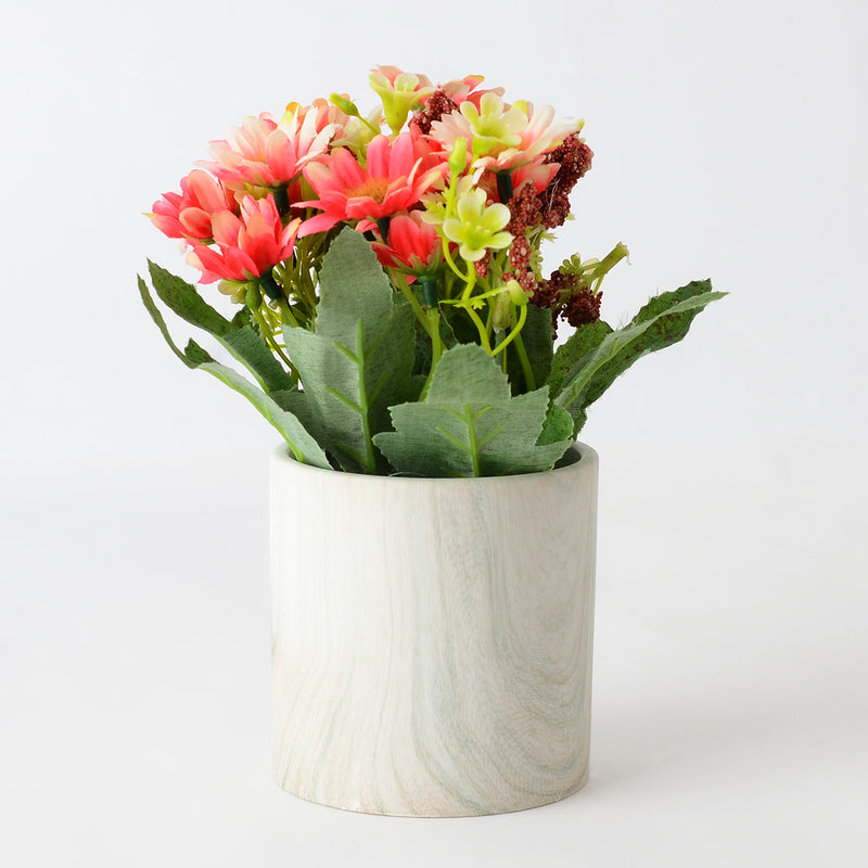 Ceramic vase with artificial flowers