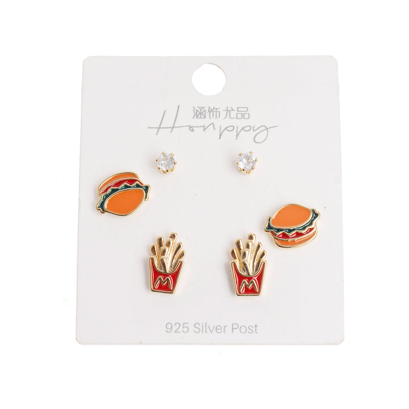 A set of 3 pairs of fast food earrings, golden color