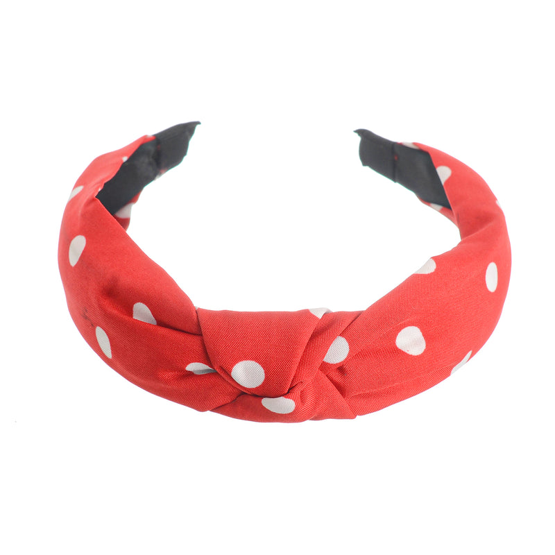 A hairband for women in the shape of a dotted bow