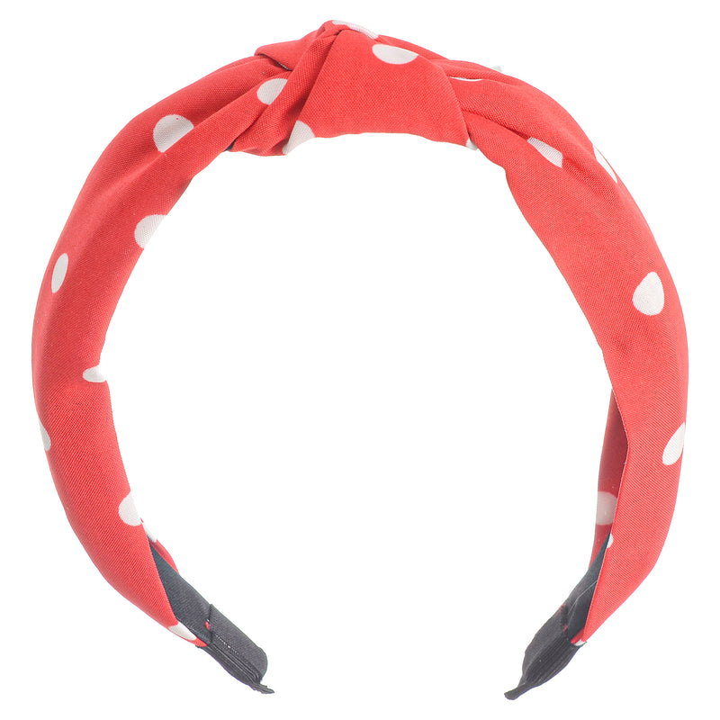 A hairband for women in the shape of a dotted bow