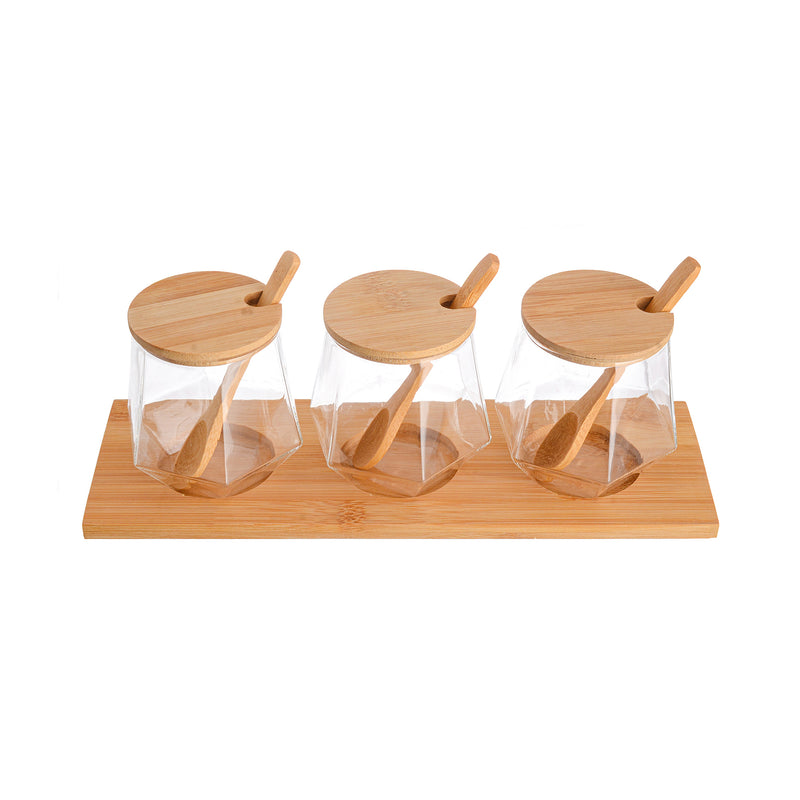 A set of spices in glass jars with a lid and a wooden base in a geometric shape, 3 pieces, transparent, 9 * 6.5 * 3 bottles