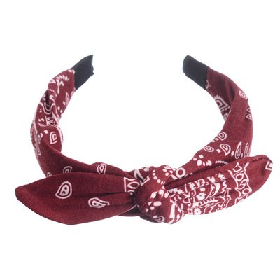 A bow-shaped headband for women, patterned