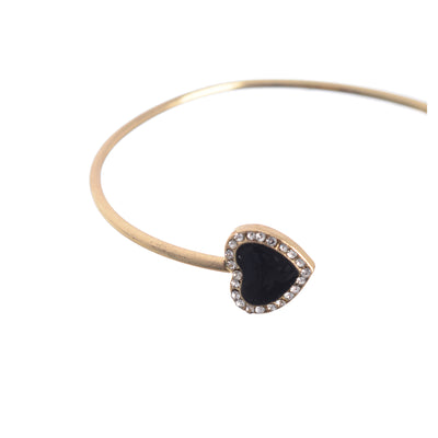 Heart-shaped bracelet decorated with open zircon stones in gold color