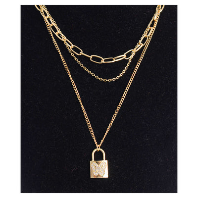 A 3-layer chain with a hollow, butterfly-shaped lock with zircon lobes and a gold chain