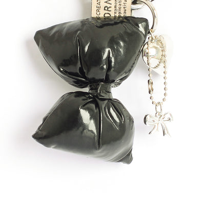 ميدالية فيونكة تعليقة كميدالية زينة للشنط