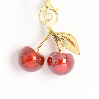 ميدالية و سلسلة مفاتيح ودلايه شنطة يد بتصميم كريز لون أحمر*ذهبي