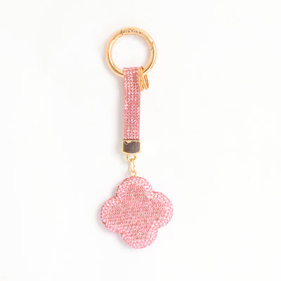 ميدالية و سلسلة مفاتيح ودلايه شنطة يد على شكل زهرة رباعية بأحجار الراين