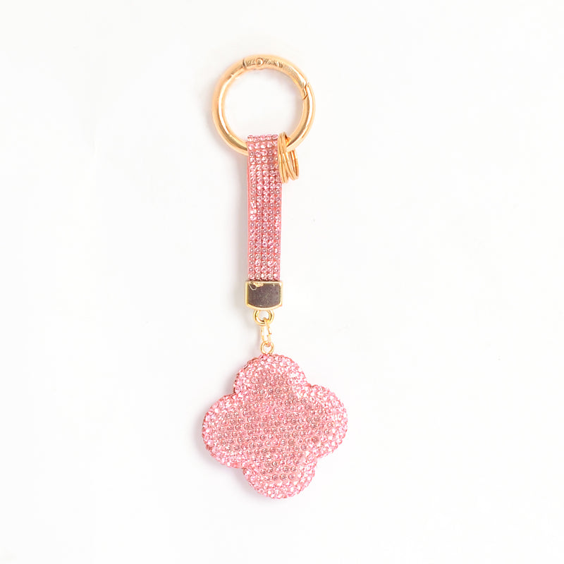 ميدالية و سلسلة مفاتيح ودلايه شنطة يد على شكل زهرة رباعية بأحجار الراين