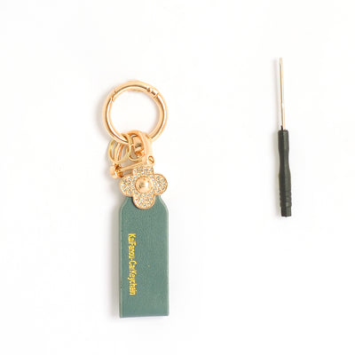 ميدالية و سلسلة مفاتيح ودلايه شنطة يد على شكل زهرة مرصعة بفصوص الزركون