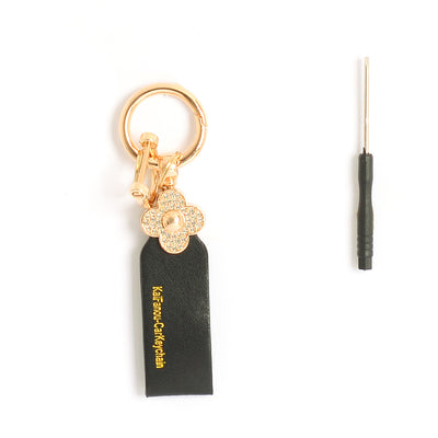 ميدالية و سلسلة مفاتيح ودلايه شنطة يد على شكل زهرة مرصعة بفصوص الزركون