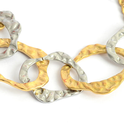 انسيال بلون ذهبي وفضي بتصميم حلقات متعرجة متداخلة