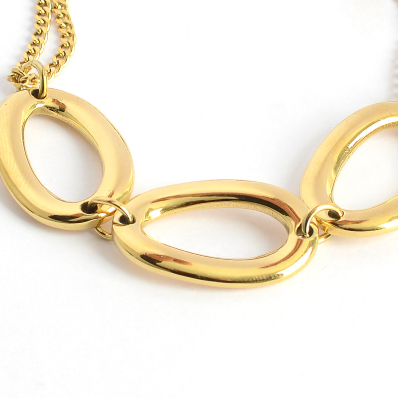 انسيال نسائي أنيق بتصميم عصري حلقات بيضاوية لون ذهبي