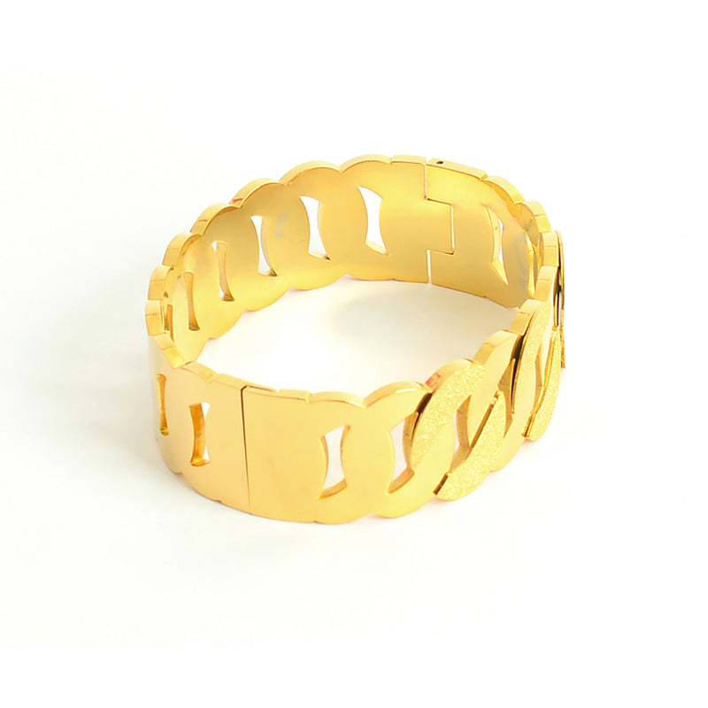 سوار يد عريض بتصميم حلقات بيضاوية متداخلة لون ذهبي