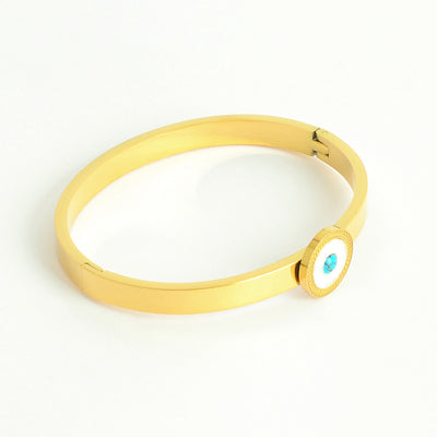 سوار يد صلب مع تصميم دائرة بيضاء بشكل رخامي بحجر فيروزي لون ذهبي