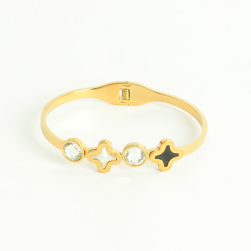 سوار يد صلب تصميم  بزخرفة زهرة رباعية وفصين زركون لون ذهبي