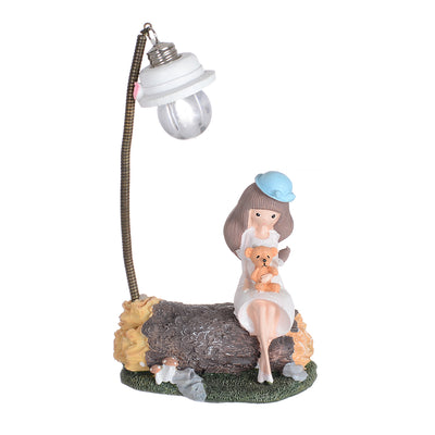 A girl's lamp carrying a teddy bear of different colors