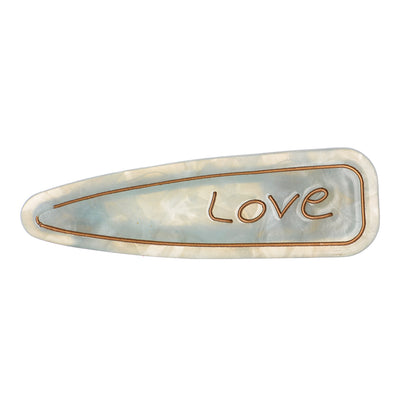 Hair clip with the word “Love” design