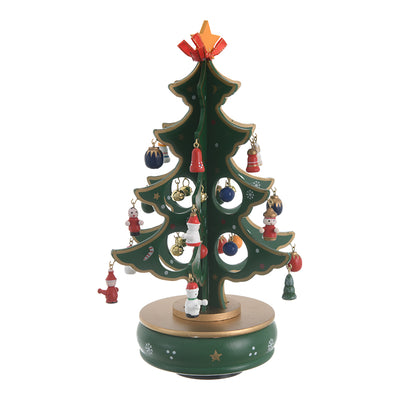 A Christmas tree music box with a wooden revolving design and a green*golden spring