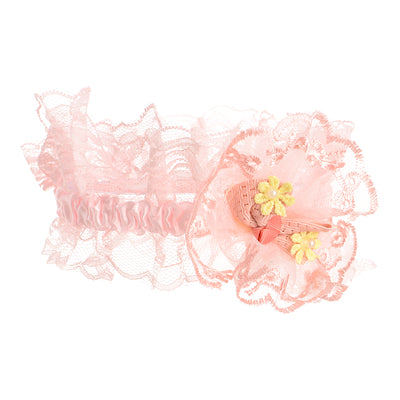 A flower headband and bow for children