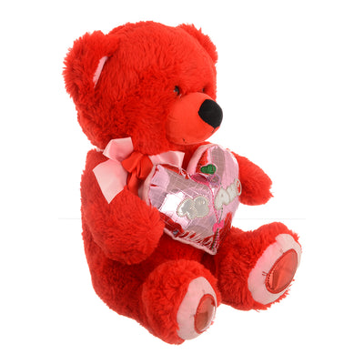 Soft fur teddy bear doll with a red leather heart design