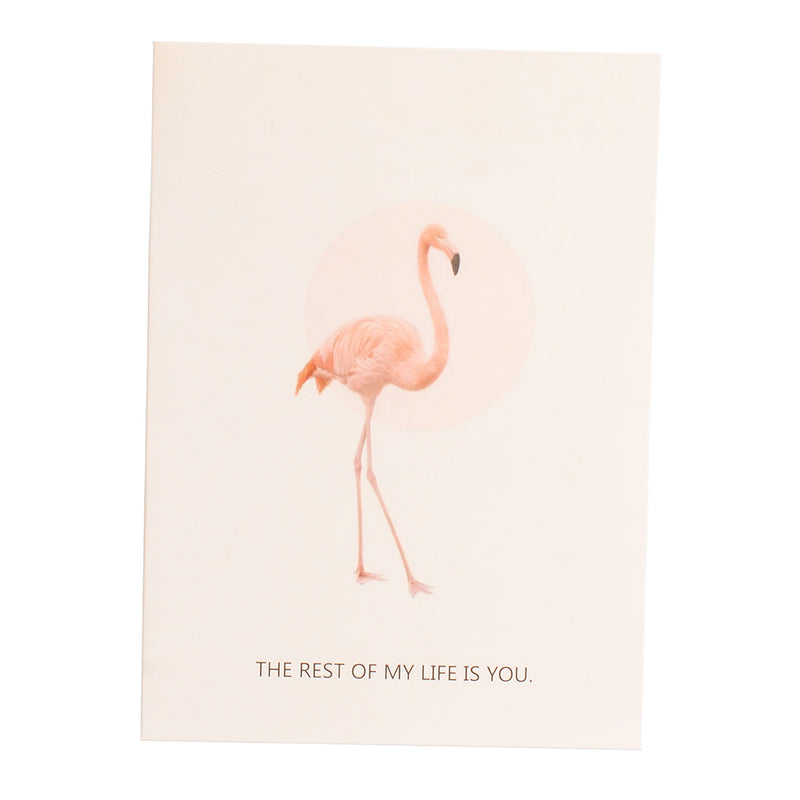 A blank flamingo style rectangular greeting card with a white interior