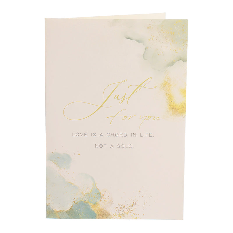 A rectangular greeting card with the writing JUST for you, green