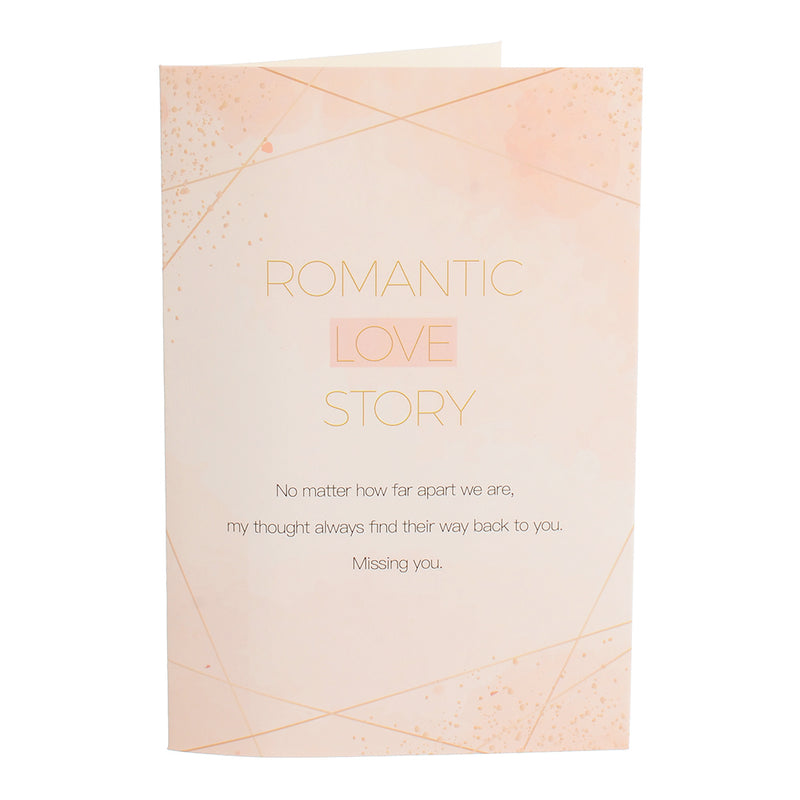 A rectangular greeting card with the writing ROMANTIC LOVE STORY, pink color