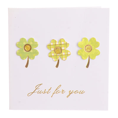 A square greeting card with an orange rose-shaped envelope