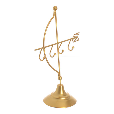 Metal holder in the form of a bow and arrow, golden color