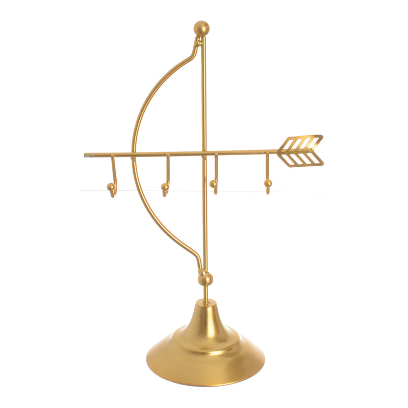 Metal holder in the form of a bow and arrow, golden color