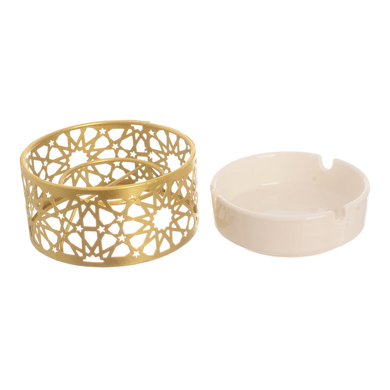 White ceramic ashtray with a separate circular base made of gold metal