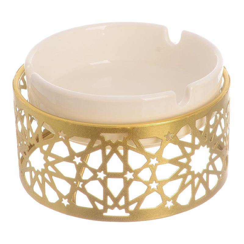 White ceramic ashtray with a separate circular base made of gold metal