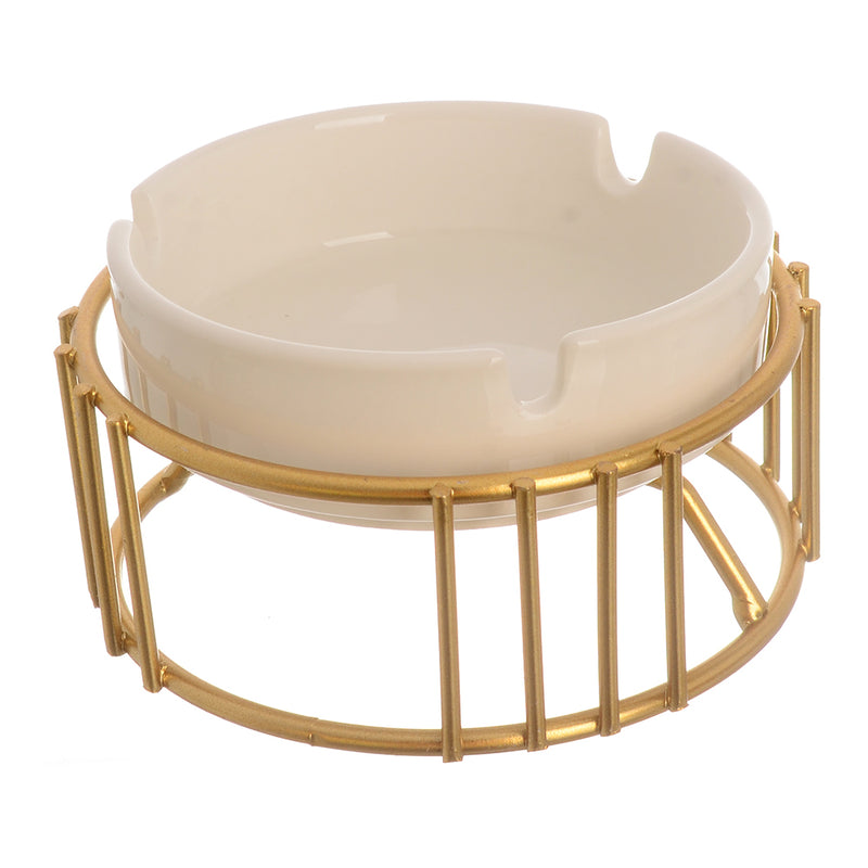 White ceramic ashtray with a separate circular base made of gold metal