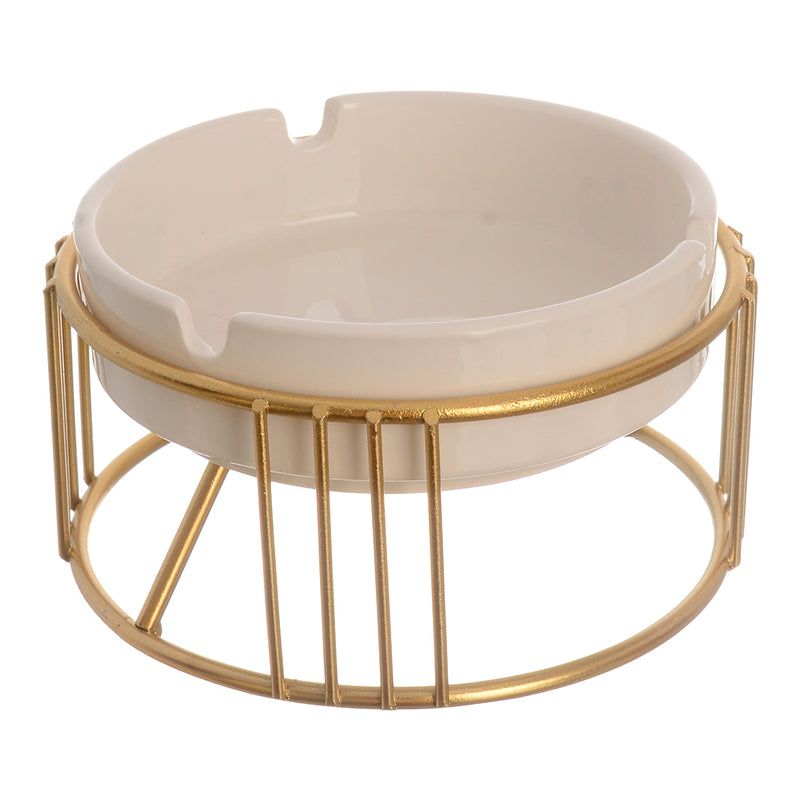 White ceramic ashtray with a separate circular base made of gold metal