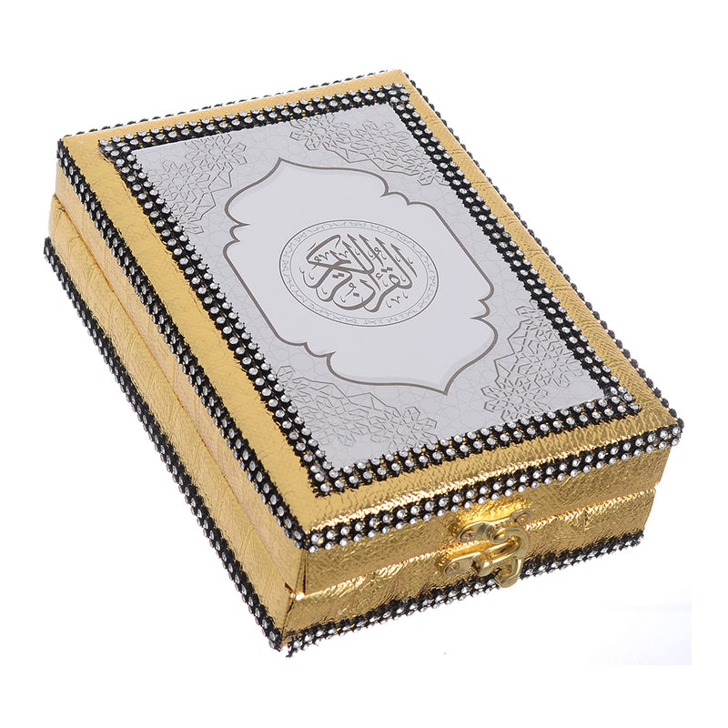 The Holy Quran inside a golden leather box