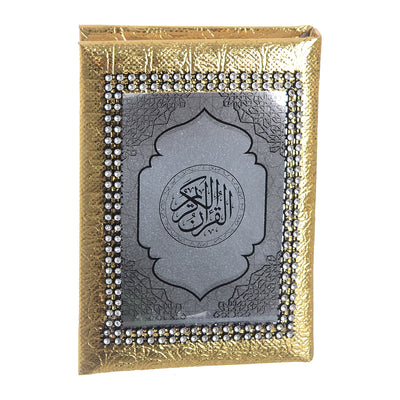 The Holy Quran inside a golden leather box